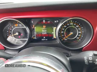 2023 Jeep Wrangler Rubicon with VIN 1C4JJXFG7PW654564, listed as a IAAI auction lot 41833534 with 22,277 mi miles and . Bid and sale history available at DreamBid. Image 7.