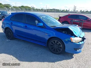 2010 Mitsubishi Lancer GTS with VIN JA32X8HW4AU004864, listed as a IAAI auction lot 41506558 with 141,514 mi miles. Bid and sale history available at carsss.com. Image 1.