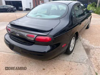 1999 Ford Taurus SE with VIN 1FAFP53SXXA145301, listed as a Copart auction lot 60351535 with 57,262 mi miles and Clean title. Bid and sale history available at DreamBid. Image 4.
