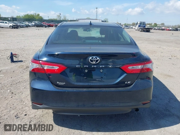 2019 Toyota Camry LE with VIN 4T1B11HK3KU254083, listed as a IAAI auction lot 42091530 with 26,635 mi miles and . Bid and sale history available at DreamBid. Image 16.