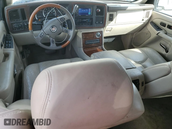 2004 Cadillac Escalade z VIN 1GYEC63T44R185526, wystawiony jako Copart lot #50969335 z przebiegiem 129 386 mil mil oraz Szkoda całkowita • Salvage title. Historia ofert i sprzedaży dostępna na DreamBid. Obrazek 8.