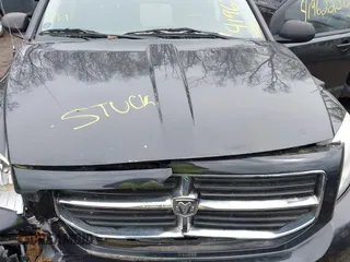 2011 Dodge Caliber Mainstreet with VIN 1B3CB3HA5BD168574, listed as a IAAI auction lot 41962230 with Not Provided miles and . Bid and sale history available at DreamBid. Image 10.