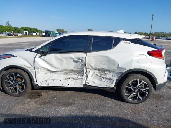 2021 Toyota C-HR LE with VIN NMTKHMBX0MR123981, listed as a IAAI auction lot 41273382 with 51,988 mi miles. Bid and sale history available at carsss.com. Image 14.