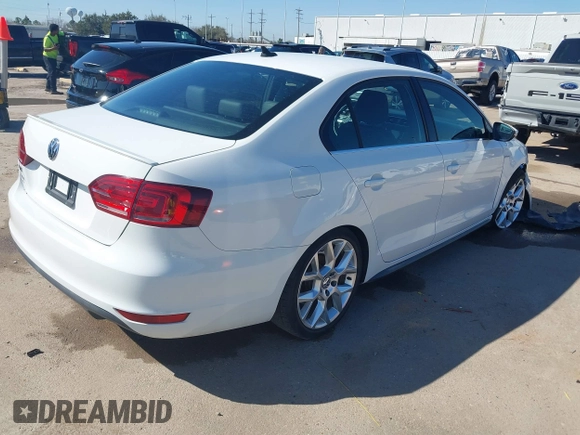 2014 Volkswagen Jetta GLI Edition 30 z VIN 3VW4S7AJ3EM278162, wystawiony jako IAAI lot #41649711 z przebiegiem 136 402 mil mil oraz . Historia ofert i sprzedaży dostępna na DreamBid. Obrazek 4.