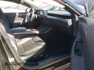 2023 Tesla Model S with VIN 5YJSA1E54PF531021, listed as a IAAI auction lot 42014104 with Not provided miles and . Bid and sale history available at DreamBid. Image 5.