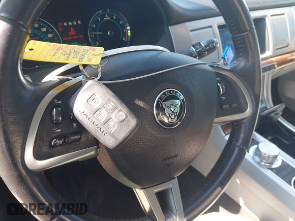 2015 Jaguar XF T Premium with VIN SAJWA0FS0FPU43248, listed as a IAAI auction lot 41977730 with 105,086 mi miles and . Bid and sale history available at DreamBid. Image 11.