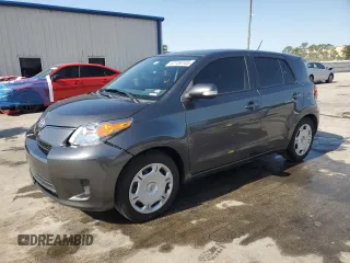 2013 Scion xD with VIN JTKKUPB46D1034412, listed as a Copart auction lot 57136145 with 134,759 mi miles and Salvage title. Bid and sale history available at DreamBid. Image 1.