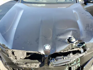 2023 BMW XM z VIN 5YM23CS08P9R97700, wystawiony jako Copart lot #79049744 z przebiegiem Nie podano mil oraz Szkody całkowita. Historia ofert i sprzedaży dostępna na DreamBid. Obrazek 12.