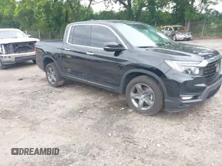2023 Honda Ridgeline RTL-E with VIN 5FPYK3F77PB052828, listed as a IAAI auction lot 42366947 with 24,658 mi miles and . Bid and sale history available at DreamBid. Image 1.