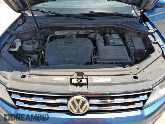 2018 Volkswagen Tiguan SEL z VIN 3VV3B7AX9JM191509, wystawiony jako Copart lot #61357405 z przebiegiem 209 934 mil mil oraz Czysty tytuł • Clean title. Historia ofert i sprzedaży dostępna na DreamBid. Obrazek 12.
