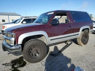 1993 Chevrolet Blazer z VIN 1GNEK18K0PJ398883, wystawiony jako Copart lot #87817225 z przebiegiem 190 787 mil mil oraz Szkoda całkowita • Salvage title. Historia ofert i sprzedaży dostępna na DreamBid. Obrazek 1.