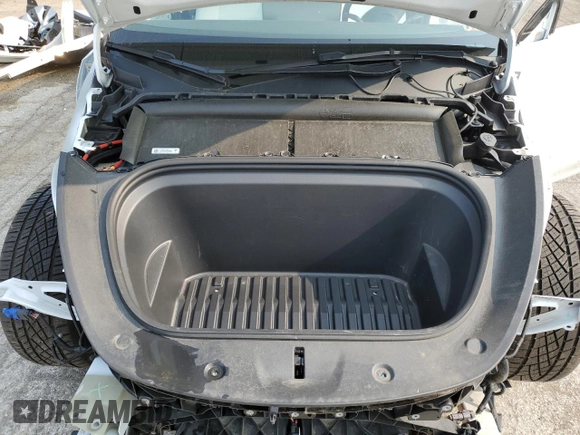 2022 Tesla Model Y Long Range z VIN 7SAYGDEE5NF355624, wystawiony jako Copart lot #58058465 z przebiegiem 33 784 mil mil oraz Szkoda całkowita • Salvage title. Historia ofert i sprzedaży dostępna na DreamBid. Obrazek 11.