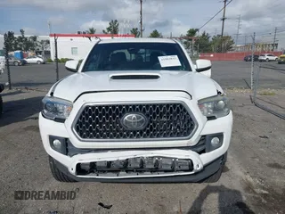 2018 Toyota Tacoma SR5 with VIN 3TMBZ5DN7JM016650, listed as a IAAI auction lot 41903835 with 105,123 mi miles and . Bid and sale history available at DreamBid. Image 13.
