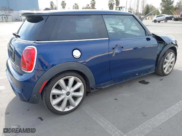 2014 MINI Cooper Hardtop S with VIN WMWXM7C51ET987925, listed as a IAAI auction lot 41709619 with NaN miles. Bid and sale history available at carsss.com. Image 4.
