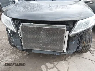 2015 Kia Sorento SX with VIN 5XYKW4A74FG603479, listed as a IAAI auction lot 41515797 with 151,496 mi miles. Bid and sale history available at carsss.com. Image 6.