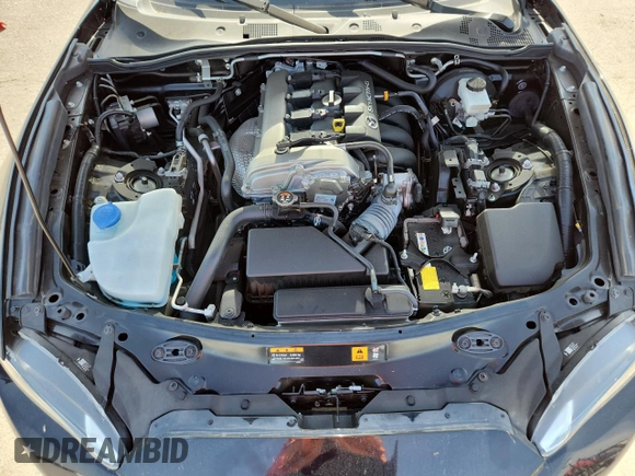 2022 Mazda MX-5 Miata Grand Touring z VIN JM1NDAM77N0503295, wystawiony jako Copart lot #58703795 z przebiegiem 14 237 mil mil oraz Szkoda całkowita • Salvage title. Historia ofert i sprzedaży dostępna na DreamBid. Obrazek 11.