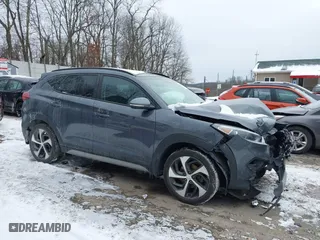 2018 Hyundai Tucson Value with VIN KM8J3CA24JU726897, listed as a IAAI auction lot 41396000 with 55,320 mi miles. Bid and sale history available at carsss.com. Image 14.