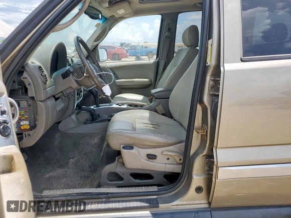 2005 Jeep Liberty Limited with VIN 1J8GL58K35W724478, listed as a Copart auction lot 61165405 with 202,099 mi miles and Salvage title. Bid and sale history available at DreamBid. Image 7.