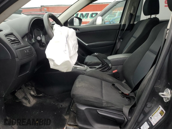 2014 Mazda CX-5 Sport with VIN JM3KE4BE0E0428322, listed as a Copart auction lot 56012495 with 278,146 mi miles and Salvage title. Bid and sale history available at DreamBid. Image 7.