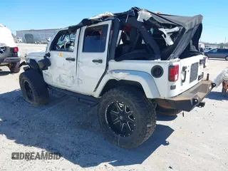 2016 Jeep Wrangler Unlimited Sahara z VIN 1C4HJWEG3GL115175, wystawiony jako IAAI lot #41686551 z przebiegiem Nie podano mil oraz . Historia ofert i sprzedaży dostępna na DreamBid. Obrazek 3.