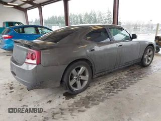 2010 Dodge Charger SXT with VIN 2B3CA3CV1AH250204, listed as a IAAI auction lot 41692787 with 111,757 mi miles. Bid and sale history available at carsss.com. Image 4.