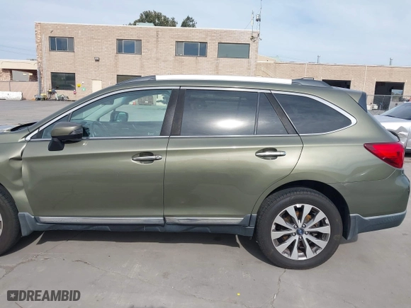 2017 Subaru Outback Touring with VIN 4S4BSETCXH3371887, listed as a IAAI auction lot 41692515 with 57,039 mi miles. Bid and sale history available at carsss.com. Image 14.