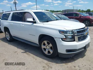 2015 Chevrolet Suburban LT z VIN 1GNSKJKCXFR300561, wystawiony jako IAAI lot #42249035 z przebiegiem 187 675 mil mil oraz . Historia ofert i sprzedaży dostępna na DreamBid. Obrazek 1.