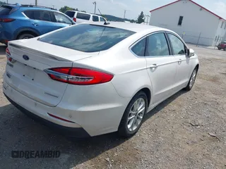 2019 Ford Fusion Titanium with VIN 3FA6P0SU8KR192833, listed as a IAAI auction lot 42818081 with 71,188 mi miles and . Bid and sale history available at DreamBid. Image 4.