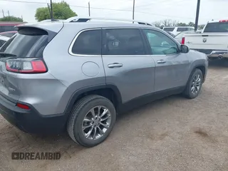 2021 Jeep Cherokee Altitude with VIN 1C4PJLLB2MD164004, listed as a IAAI auction lot 42083946 with 99,136 mi miles and . Bid and sale history available at DreamBid. Image 4.