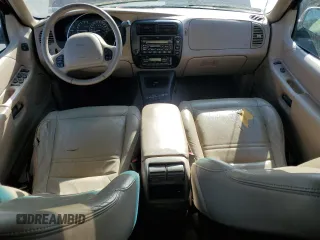 2001 Ford Explorer z VIN 1FMDU64P21UB11722, wystawiony jako Copart lot #57425525 z przebiegiem 116 938 mil mil oraz Szkoda całkowita • Salvage title. Historia ofert i sprzedaży dostępna na DreamBid. Obrazek 8.