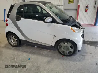 2013 Smart fortwo Pure с VIN WMEEJ3BA9DK626037, выставлен на аукционе Copart как лот 54573255 с пробегом 66 070 миль миль и Чистый • Clean title. История ставок и продаж доступна на DreamBid. Изображение 4.
