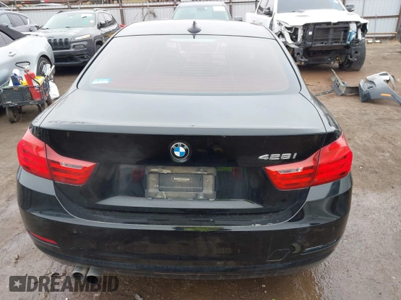 2014 BMW 4 Series 428i with VIN WBA3N7C50EF718339, listed as a IAAI auction lot 41403096 with 143,478 mi miles and . Bid and sale history available at carsss.com. Image 17.