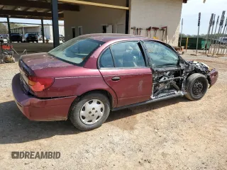 2002 Saturn SL with VIN 1G8ZH52872Z117289, listed as a Copart auction lot 50993815 with Not provided miles and Salvage title. Bid and sale history available at DreamBid. Image 3.
