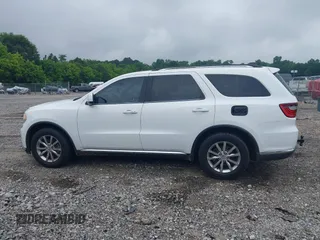 2016 Dodge Durango SXT with VIN 1C4RDHAG2GC330995, listed as a IAAI auction lot 42410612 with 118,412 mi miles and . Bid and sale history available at DreamBid. Image 14.
