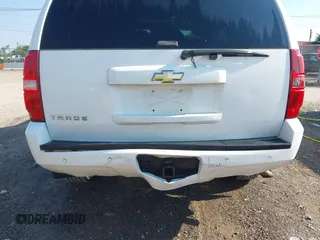2007 Chevrolet Tahoe LTZ with VIN 1GNFK13057J121978, listed as a IAAI auction lot 42643202 with 240,004 mi miles and . Bid and sale history available at DreamBid. Image 6.