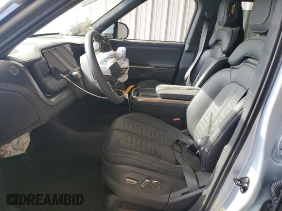 2025 Rivian R1S Adventure with VIN 7PDSGBBA4SN049237, listed as a Copart auction lot 53455505 with 0 mi miles and Salvage Title. Bid and sale history available at carsss.com. Image 7.