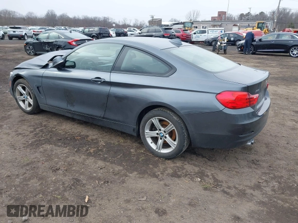 2014 BMW 4 Series 428i xDrive with VIN WBA3N9C50EK246002, listed as a IAAI auction lot 41612256 with 100,915 mi miles and . Bid and sale history available at carsss.com. Image 3.