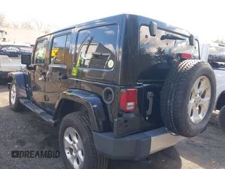 2015 Jeep Wrangler Unlimited Sahara with VIN 1C4BJWEGXFL506361, listed as a IAAI auction lot 41865418 with 80,841 mi miles. Bid and sale history available at carsss.com. Image 3.
