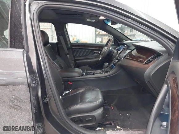 2015 Ford Taurus Limited with VIN 1FAHP2J8XFG192225, listed as a IAAI auction lot 41324244 with 100,395 mi miles. Bid and sale history available at carsss.com. Image 5.