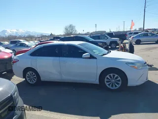 2015 Toyota Camry XLE with VIN 4T4BF1FK7FR465495, listed as a IAAI auction lot 41684622 with 126,543 mi miles and . Bid and sale history available at carsss.com. Image 12.