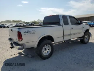 2000 Ford F-150 XL with VIN 1FTRX18L8YNB58706, listed as a Copart auction lot 53243215 with 0 mi miles and Salvage Title. Bid and sale history available at carsss.com. Image 3.