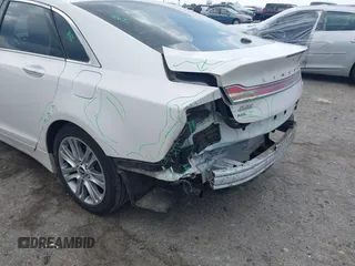 2014 Lincoln MKZ Hybrid z VIN 3LN6L2LU2ER825732, wystawiony jako IAAI lot #42606357 z przebiegiem 153 966 mil mil oraz . Historia ofert i sprzedaży dostępna na DreamBid. Obrazek 14.