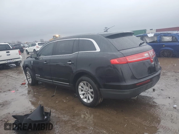 2015 Lincoln MKT with VIN 2LMHJ5NK1FBL04078, listed as a Copart auction lot 86774444 with 547,015 mi miles and Salvage Title. Bid and sale history available at DreamBid. Image 2.