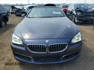 2012 BMW 6 Series 650i z VIN WBALZ3C57CDL71551, wystawiony jako Copart lot #54622705 z przebiegiem Nie podano mil oraz Szkody całkowita. Historia ofert i sprzedaży dostępna na DreamBid. Obrazek 5.