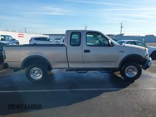 1997 Ford F-150 XL with VIN 1FTDX18W7VKB72498, listed as a IAAI auction lot 41390245 with 55,945 mi miles. Bid and sale history available at carsss.com. Image 14.