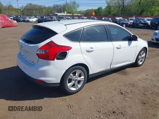 2013 Ford Focus SE with VIN 1FADP3K26DL262144, listed as a IAAI auction lot 42140228 with 107,379 mi miles. Bid and sale history available at carsss.com. Image 4.