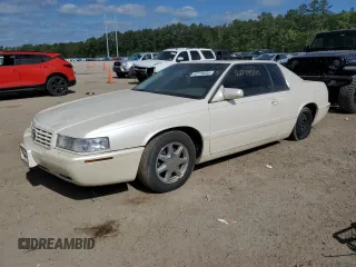 2001 Cadillac Eldorado Touring ETC z VIN 1G6ET12931B110029, wystawiony jako Copart lot #52779505 z przebiegiem 173 073 mil mil oraz Szkody całkowita. Historia ofert i sprzedaży dostępna na DreamBid. Obrazek 1.