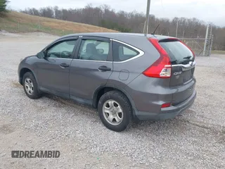 2015 Honda CR-V LX with VIN 2HKRM4H33FH617583, listed as a IAAI auction lot 41805272 with 88,214 mi miles and . Bid and sale history available at DreamBid. Image 3.