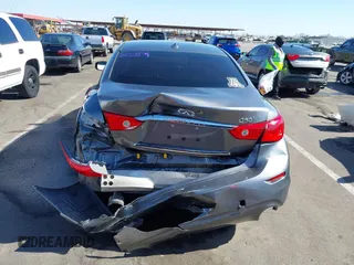 2017 Infiniti Q50 Premium z VIN JN1EV7AP5HM733602, wystawiony jako IAAI lot #42334405 z przebiegiem 174 058 mil mil oraz . Historia ofert i sprzedaży dostępna na DreamBid. Obrazek 6.