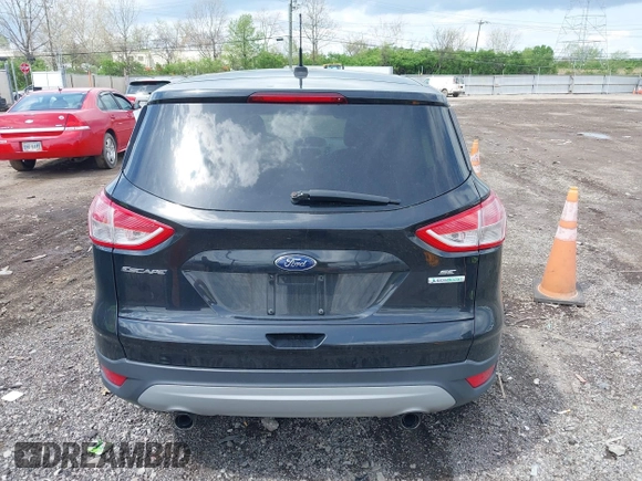 2013 Ford Escape SE with VIN 1FMCU0GX1DUA99040, listed as a IAAI auction lot 42084787 with 140,473 mi miles and . Bid and sale history available at DreamBid. Image 16.